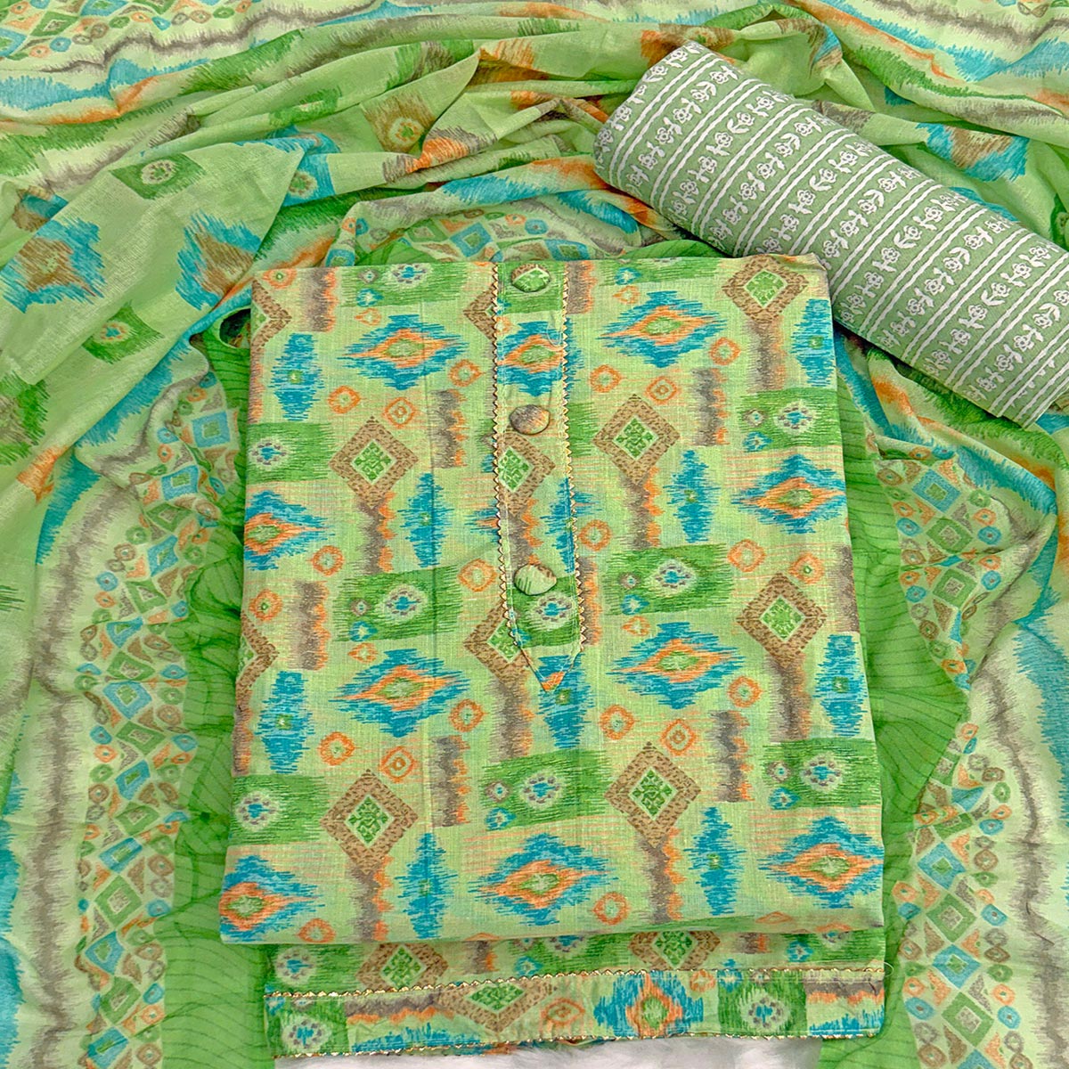 Green Contemporary Ikat & Geometric Style Print Pure Cotton Dress Material With Decorative Button