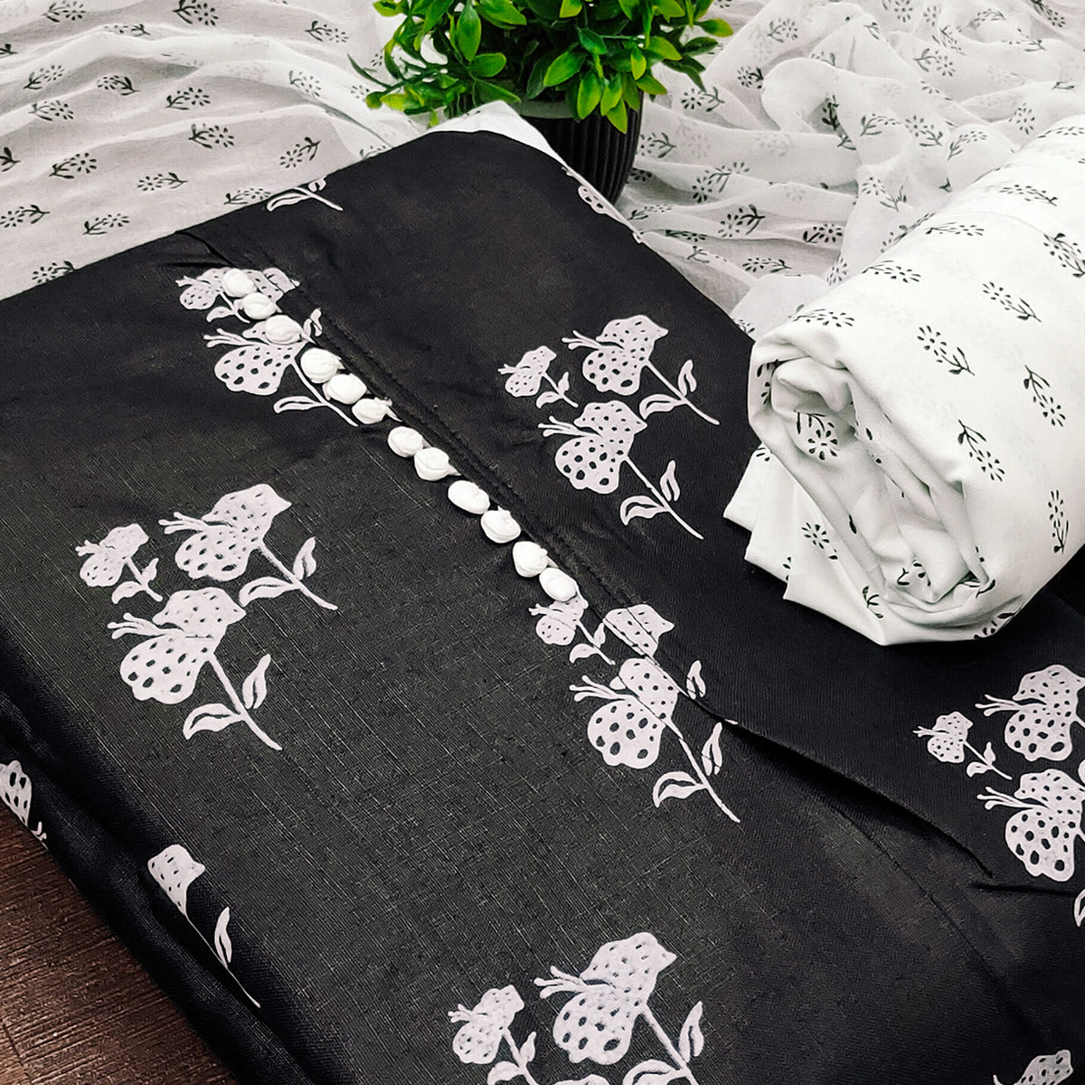Black Cotton Blend Fabric Featuring Subtle and Elegant Floral Prints