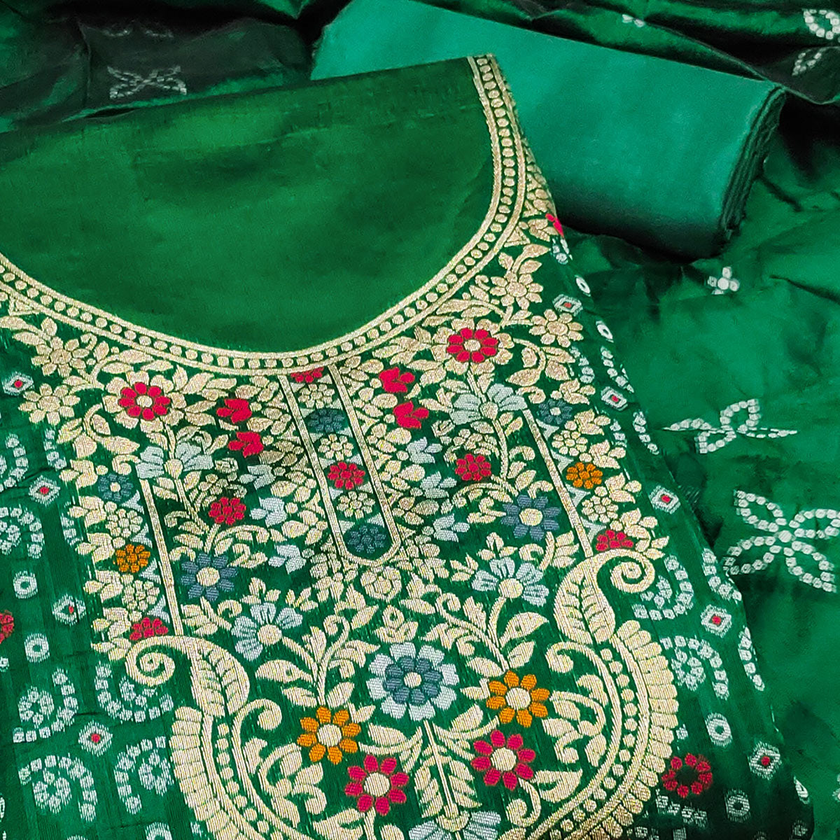 Green Banarasi Silk Jacquard Dress Material Adorned With Intricate Floral Zari Weaving