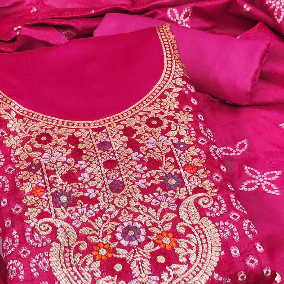 Rani Pink Banarasi Silk Jacquard Dress Material Adorned With Intricate Floral Zari Weaving