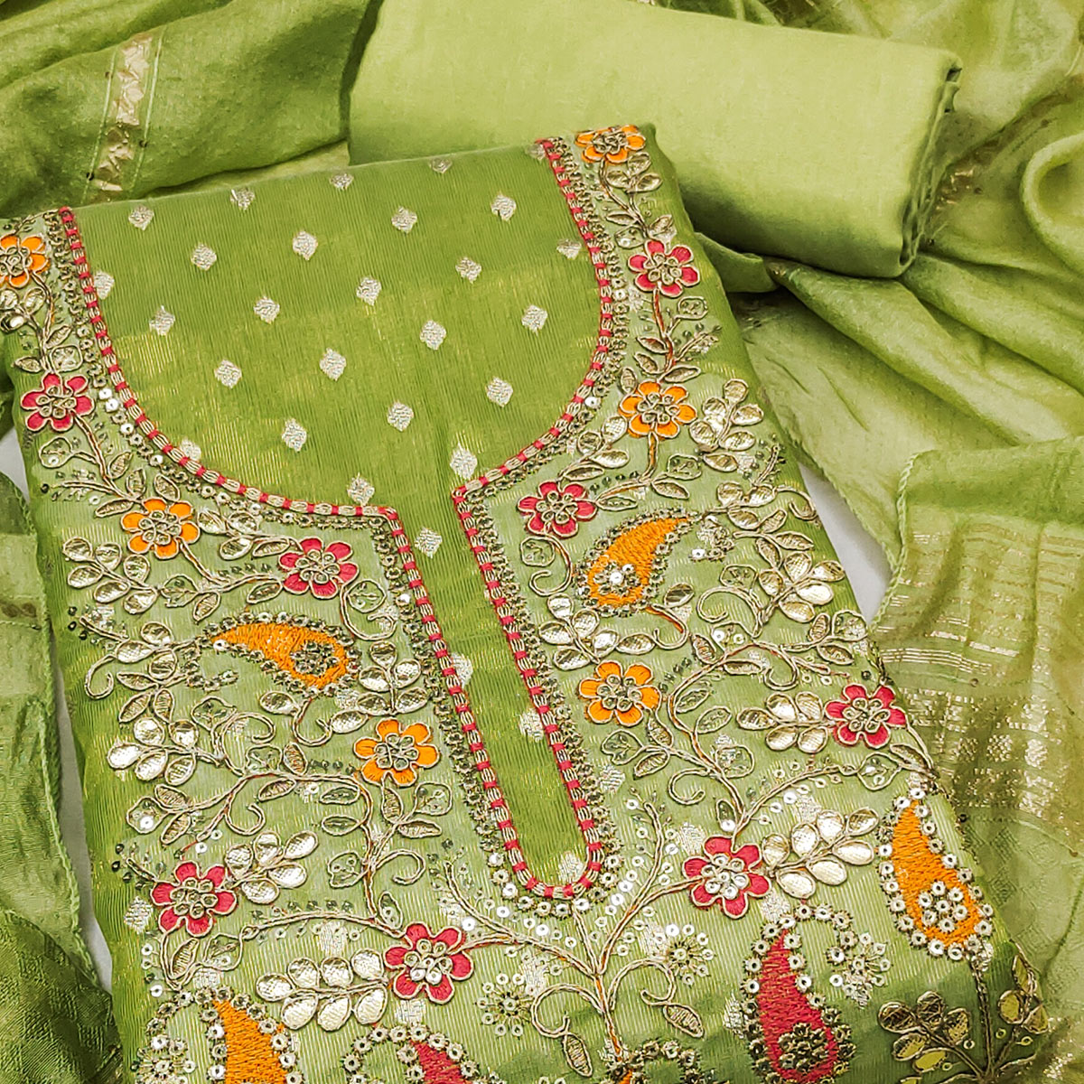 Green Woven Shimmer Dress Material Featuring Sequins Embroidery & Gota Patti Accents