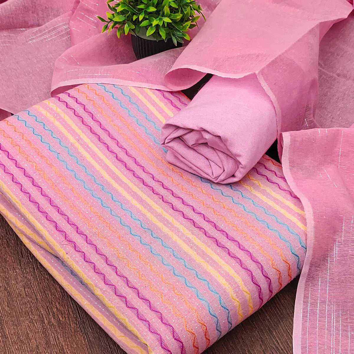 Pink Poly Cotton Blend Dress Material Highlighted With Striped Woven Work