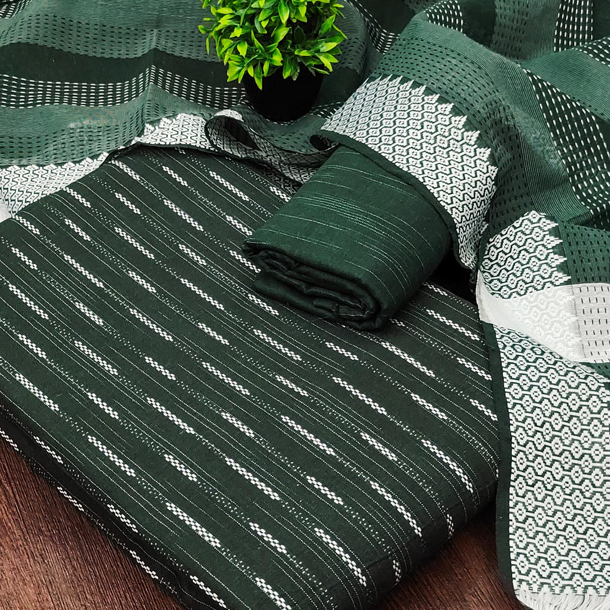 Green Poly Cotton Blend Dress Material Adorned With Striped Weaving Work