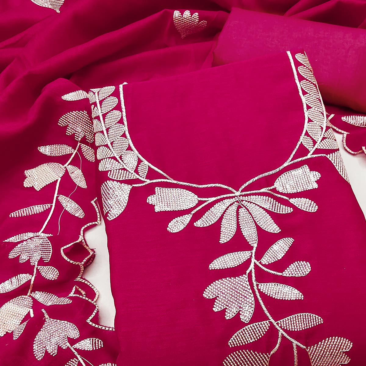 Rani Pink Vichitra Silk Dress Material Accented With Delicate Floral Thread Embroidery & Sequins