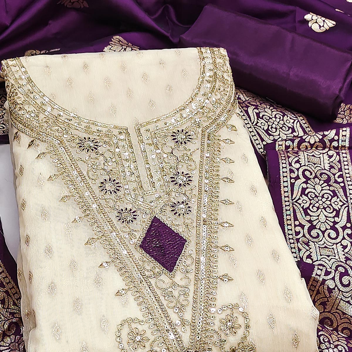 Cream & Purple Floral Butti Weaving With Intricate Cording Embroidered Shimmer Dress Material