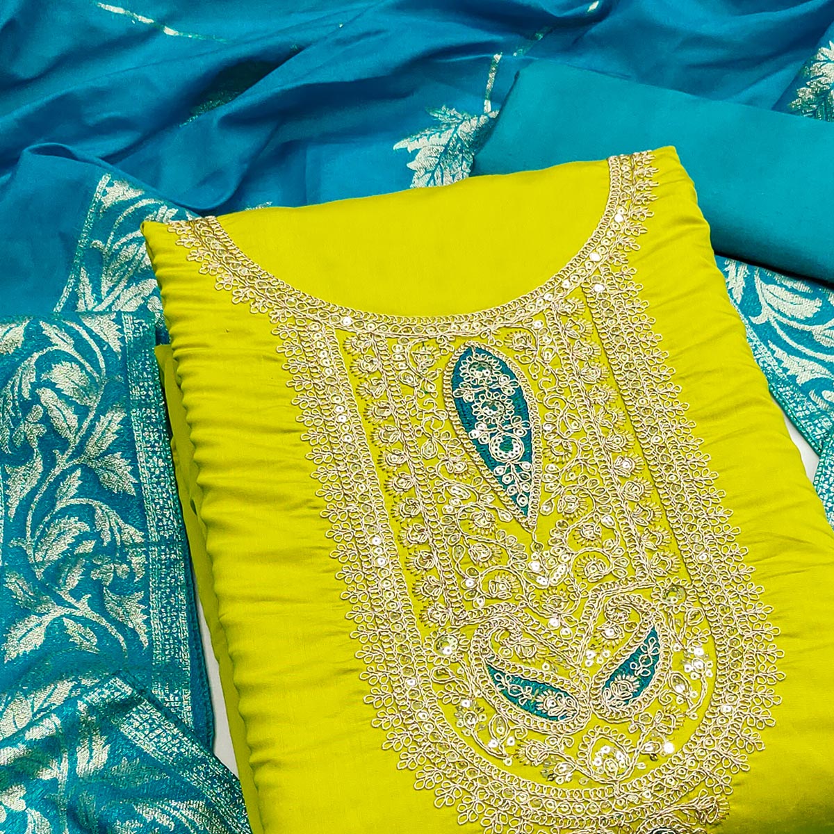 Graceful Green Silk Blend Dress Material Featuring Floral Cording Embroidery With Sequins Detailing