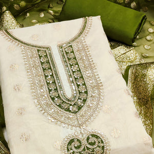 Graceful Cream & Mehendi Butti Weaving Shimmer Dress Material Adorned With Cording Embroidery Work