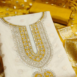 Graceful Cream & Mustard Butti Weaving Shimmer Dress Material Adorned With Cording Embroidery Work