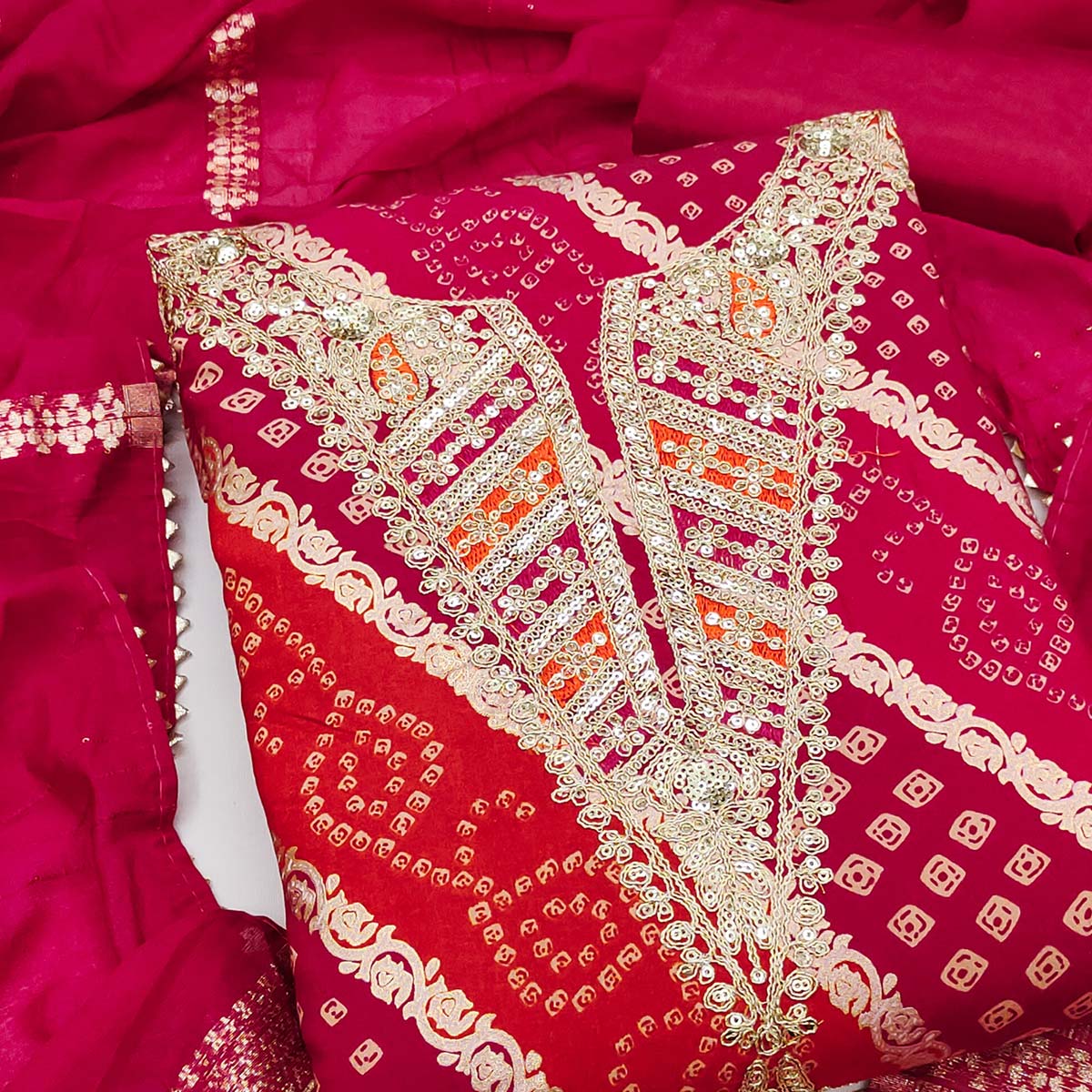 Charming Rani Pink Roman Art Silk Dress Material With Bandhani Prints & Floral Cording Embroidery