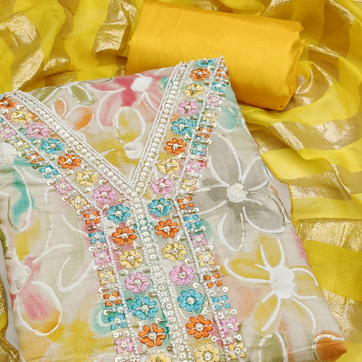 Vibrant Yellow Floral Printed Roman Art Silk Dress Material Adorned With Sparkling Beads & Sequins