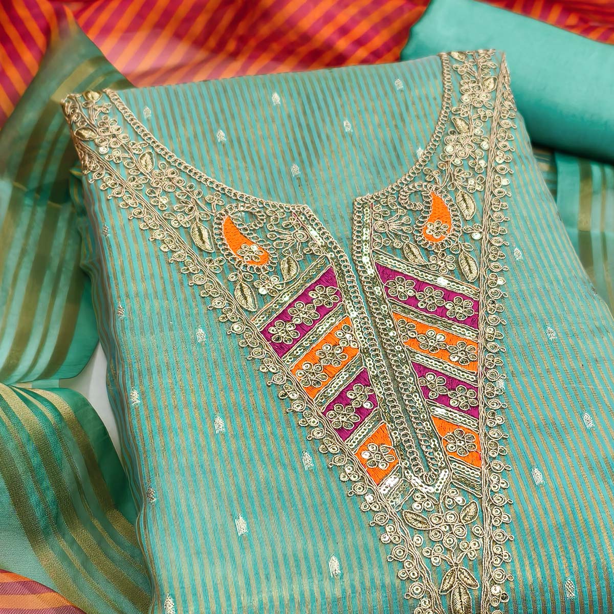 Premium Turquoise Shimmer Dress Material With Detailed Butti Weaving & Cording Embroidery