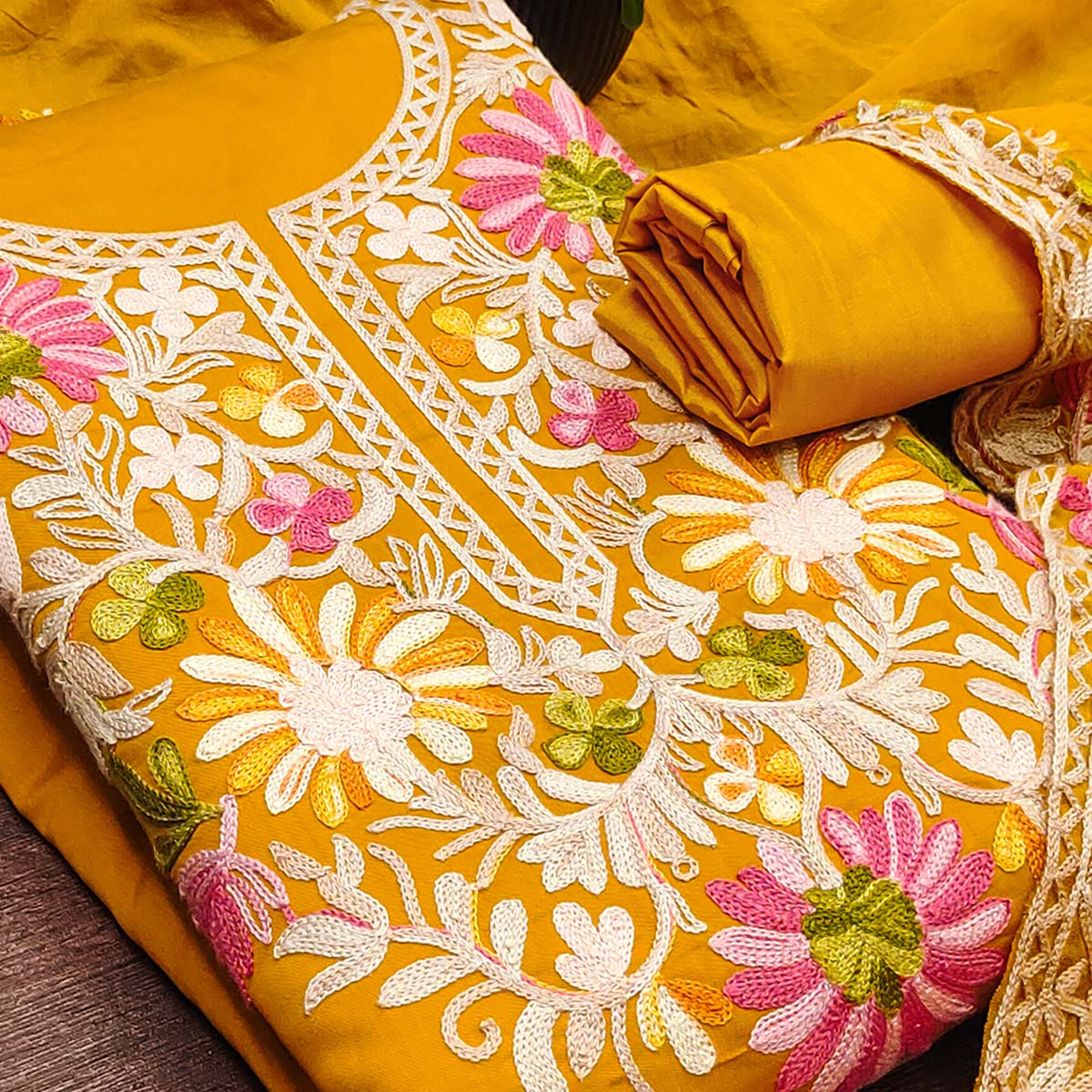 Dark Mustard Designer Roman Art Silk Dress Material Adorned With Floral Thread Embroidery Work