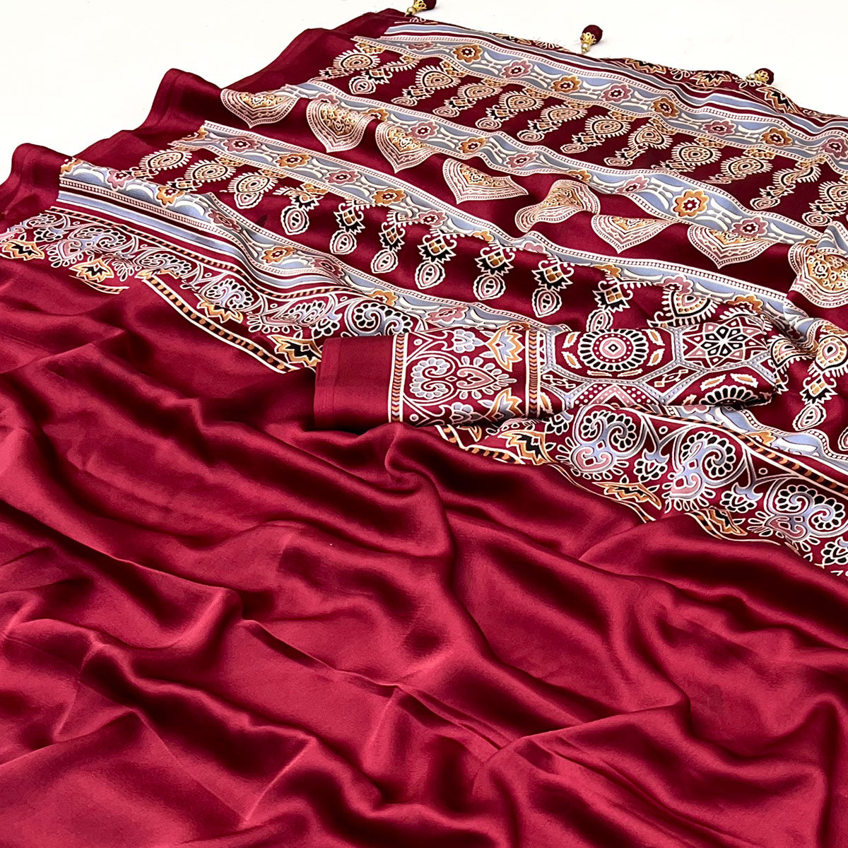 Red Ajrakh Printed Crepe Satin Saree With Tassels