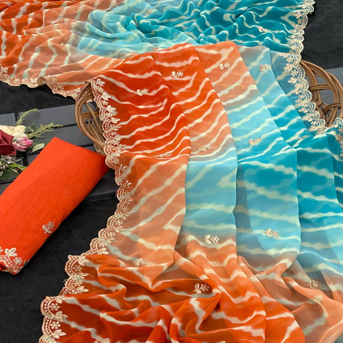 Festive Georgette Saree in Orange & Blue with Ethnic Leheriya Print and Fine Embroidery