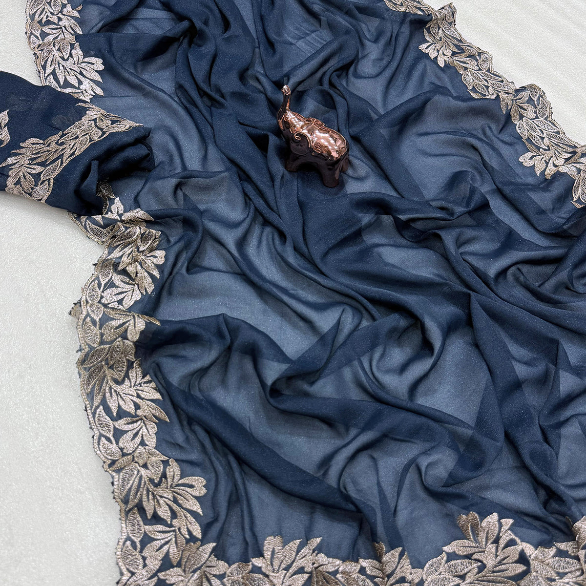 Stylish Blue Star Chiffon Saree with Traditional Zari Embellished Border