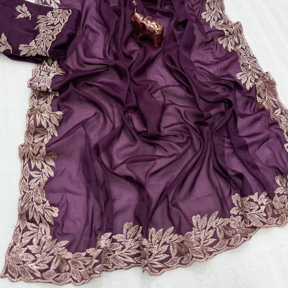 Stylish Wine Star Chiffon Saree with Traditional Zari Embellished Border