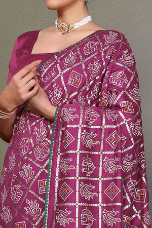 Purple Vichitra Silk Saree Featuring Bandhani Patterns and Graceful Embroidered Borders