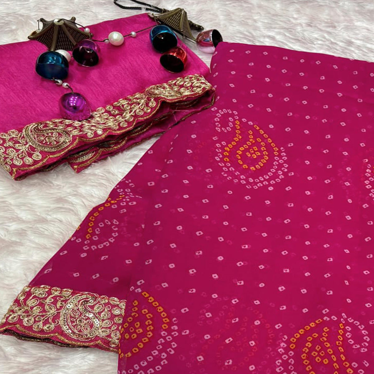 Pink Bandhani Printed Georgette Saree With Embroidered Border