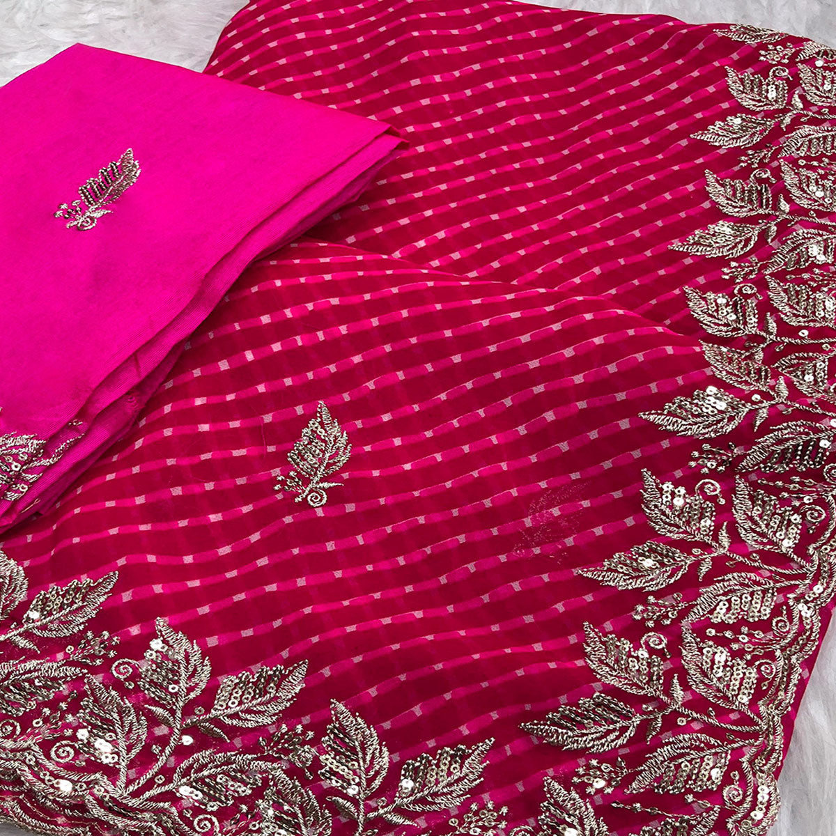 Pink Bandhani Georgette Saree Enhanced with Lavish Embroidered Border