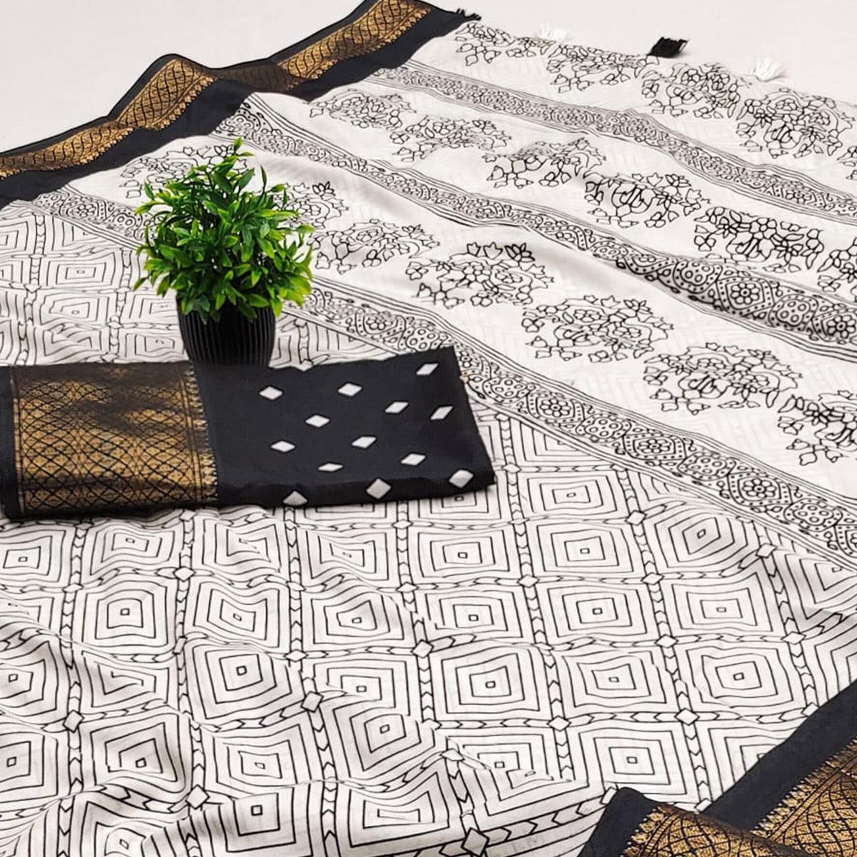 Offwhite & Black Geometric Printed Dola Silk Saree With Intricate Woven Border