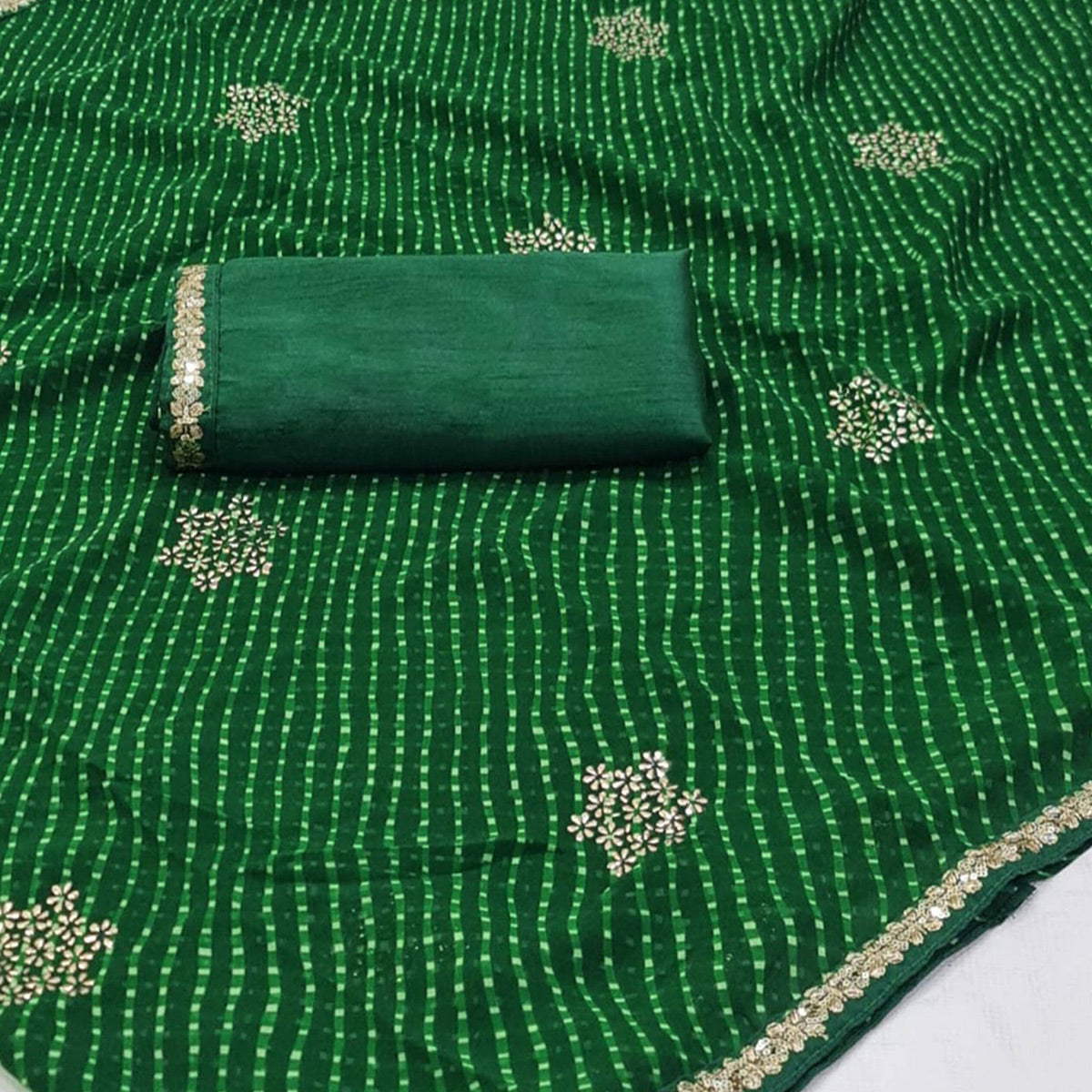 Dark Green Printed Georgette Saree With lace Border