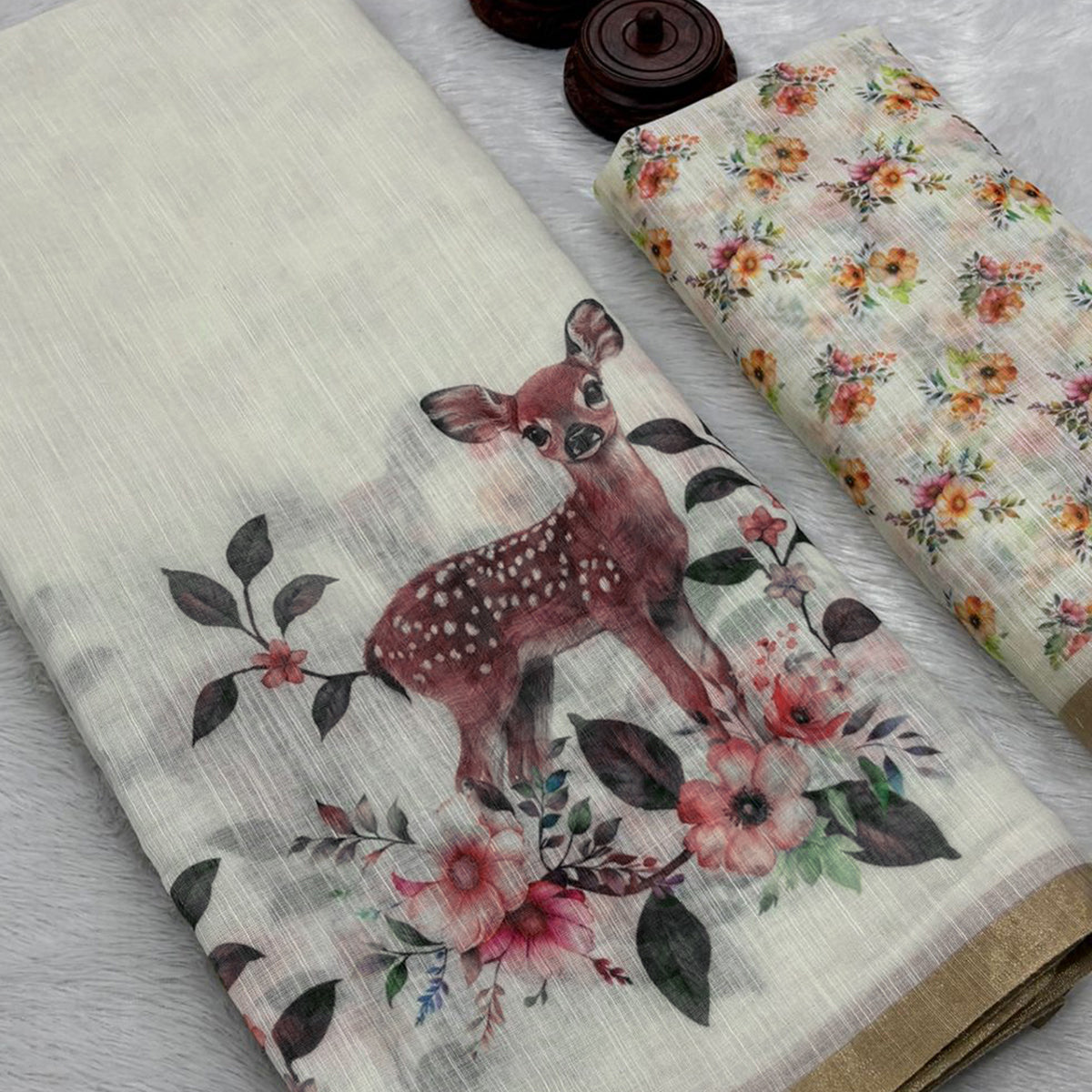 Off White Handprinted Linen Saree with Beautifully Woven Zari Edging