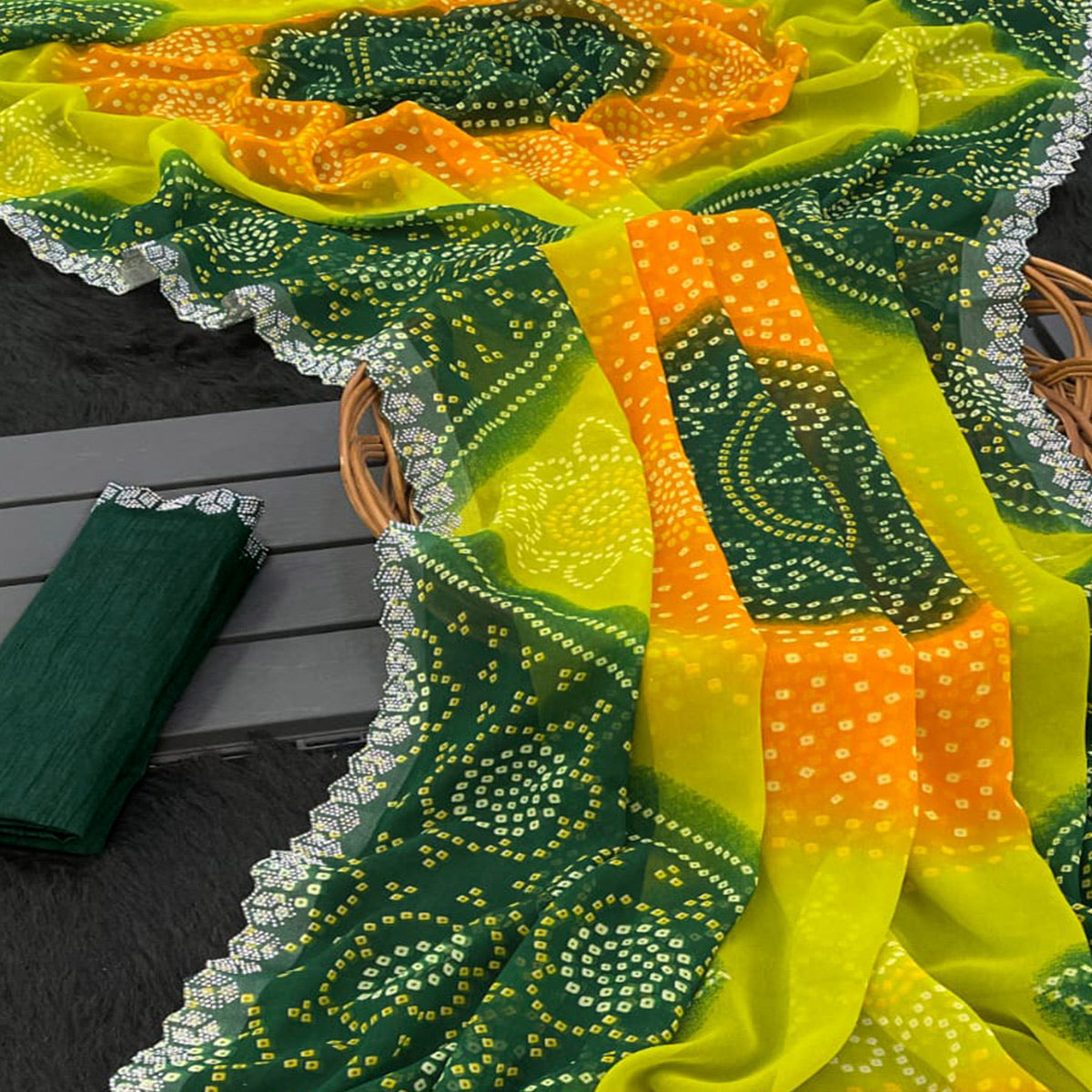 Green & Orange Georgette Saree With Traditional Bandhani Print And Sparkling Stone Work Border