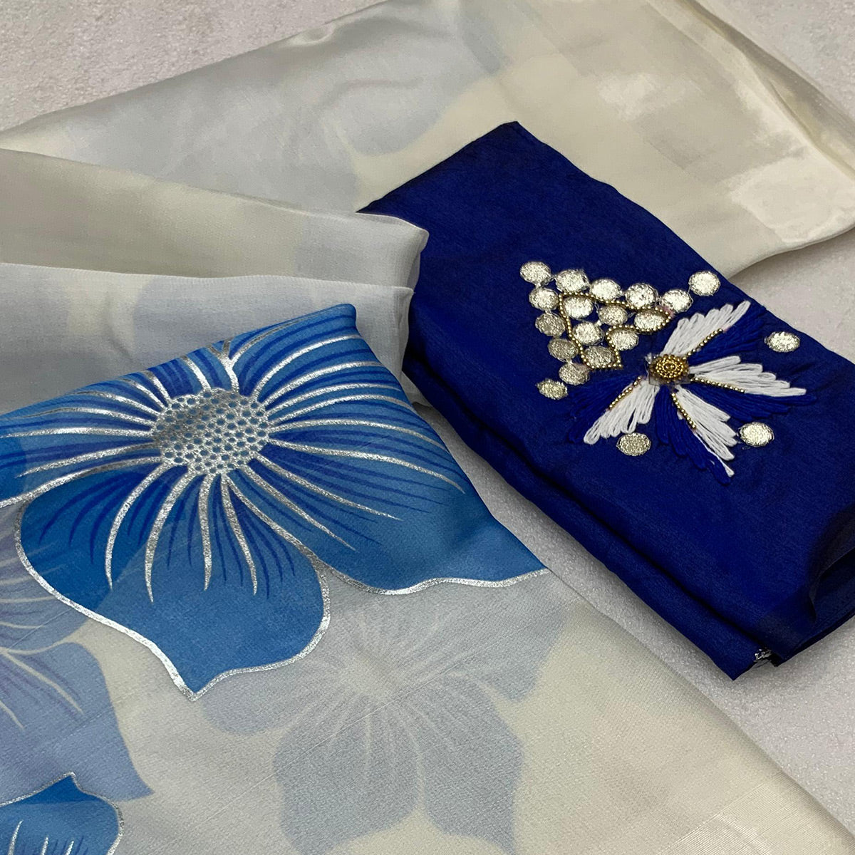 White & Blue Floral Foil Printed Organza Saree