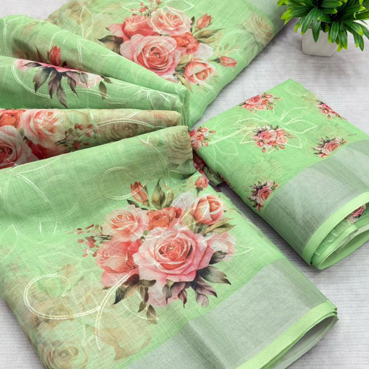 Green Floral Printed Linen Cotton Saree with Subtle Texture and Thread Work Highlights