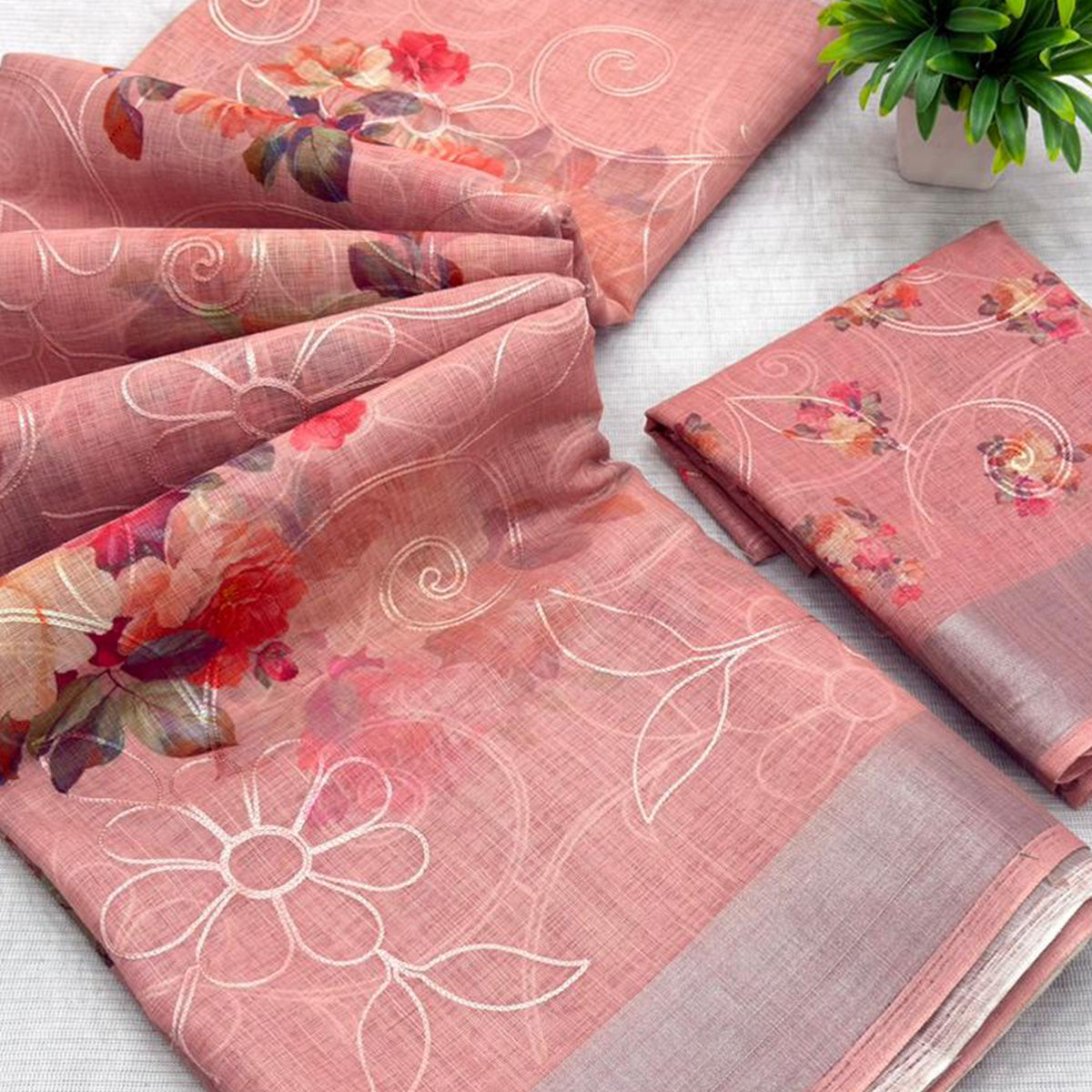 Peach Floral Printed Linen Cotton Saree with Subtle Texture and Thread Work Highlights