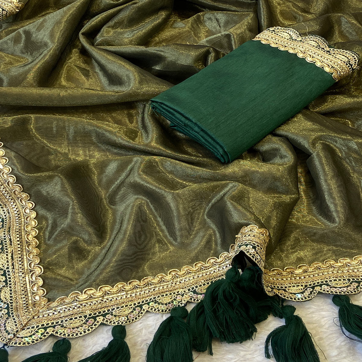 Mehendi Green Net Saree With Intricate Sequin Embroidery & Tassel Embellished Pallu