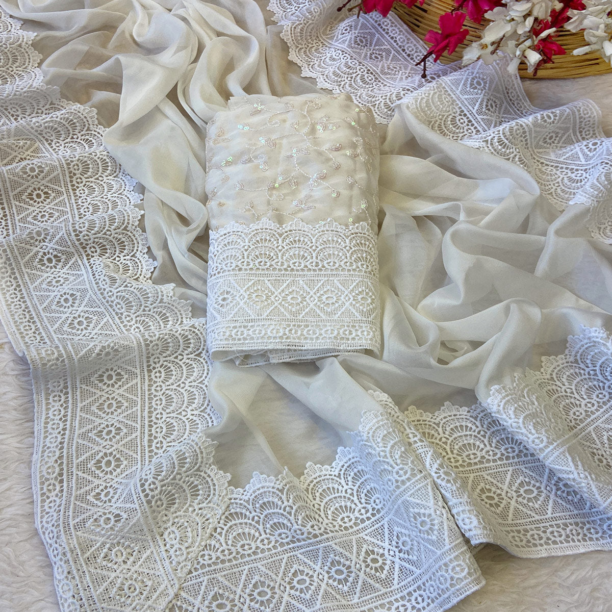 White Solid Satin Rangoli Saree Enhanced with Intricate Embroidered Border Work