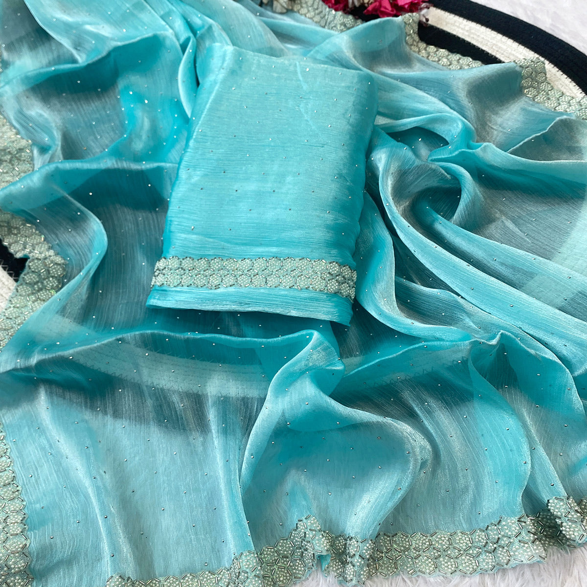 Blue Satin Burberry Saree Adorned With Sparkling Swarovski & Elegant Moti Work Border
