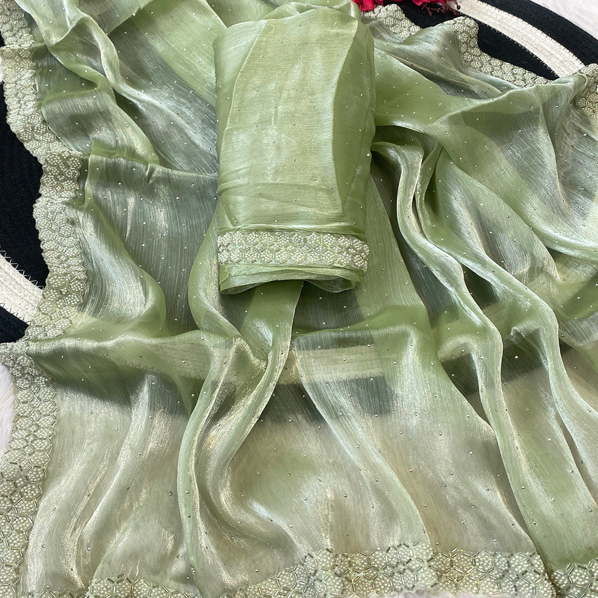 Pista Green Satin Burberry Saree Adorned With Sparkling Swarovski & Elegant Moti Work Border