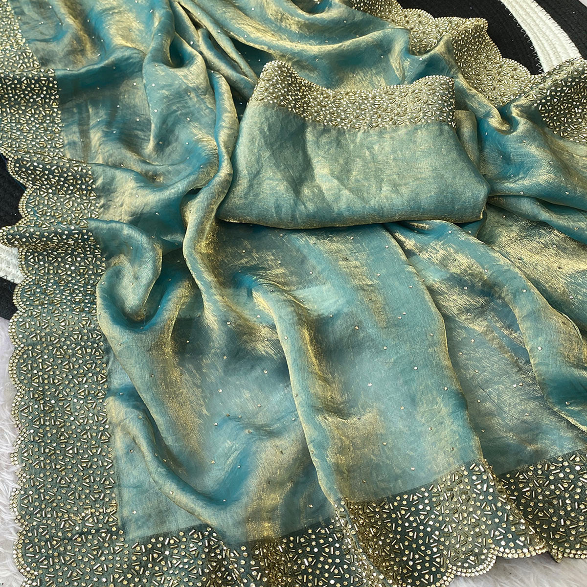 Blue Fandy Satin Saree Featuring Intricate Swarovski Work & Decorative Zarkan Border