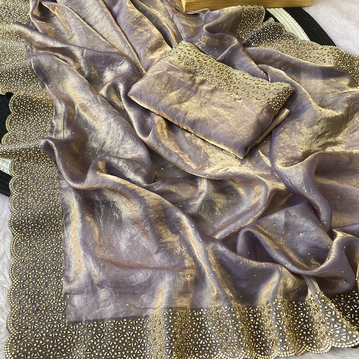 Lavender Fandy Satin Saree Featuring Intricate Swarovski Work & Decorative Zarkan Border