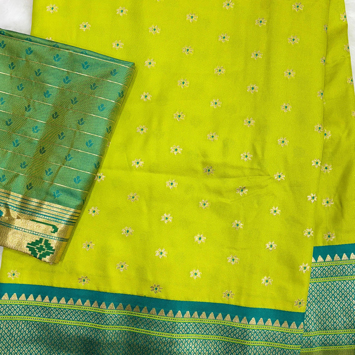 Graceful Green Silk Blend Saree Adorned With Intricate Floral Zari Weaving