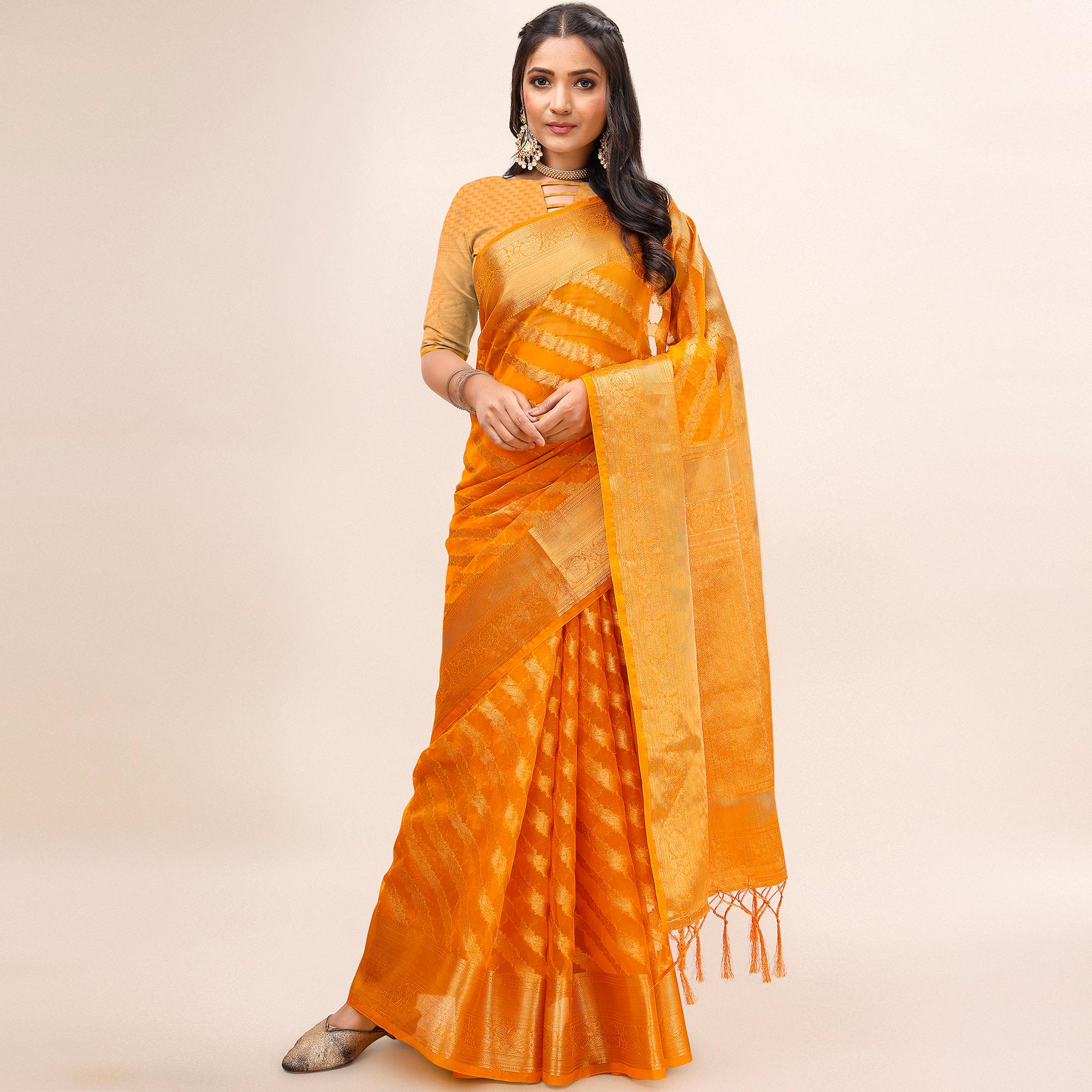 Orange Woven Organza Saree With Tassels
