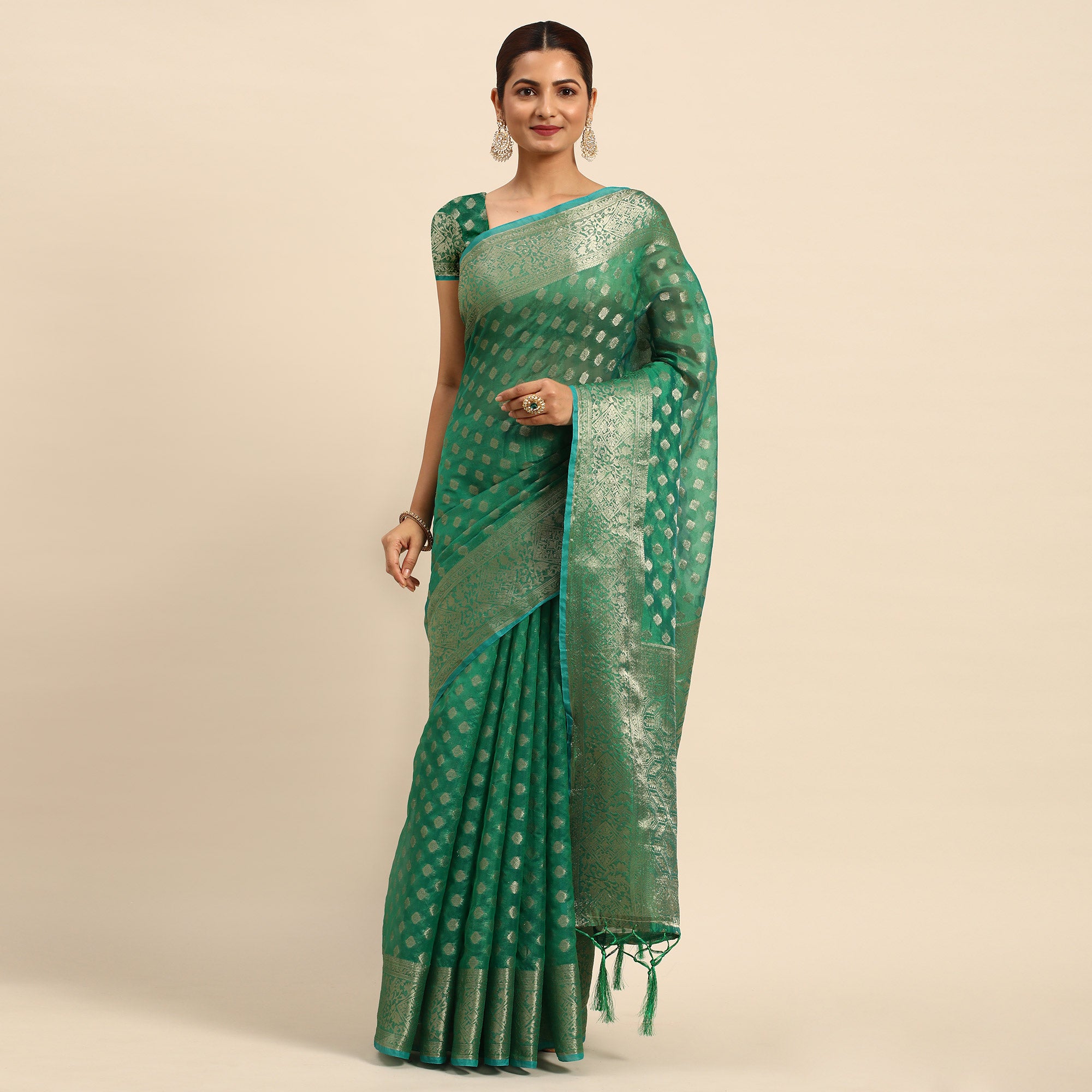 Green Woven Organza Silk Saree With Tassels