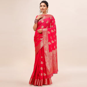 Pink Woven Chiffon Saree With Tassels