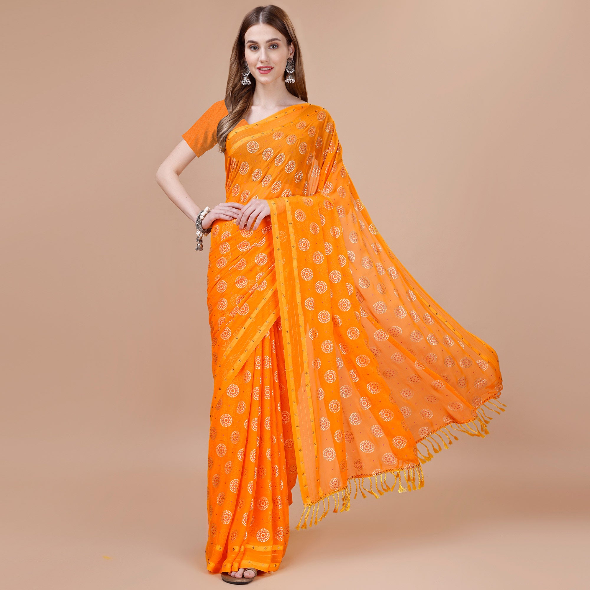 Orange Foil Printed Chiffon Saree With Tassels