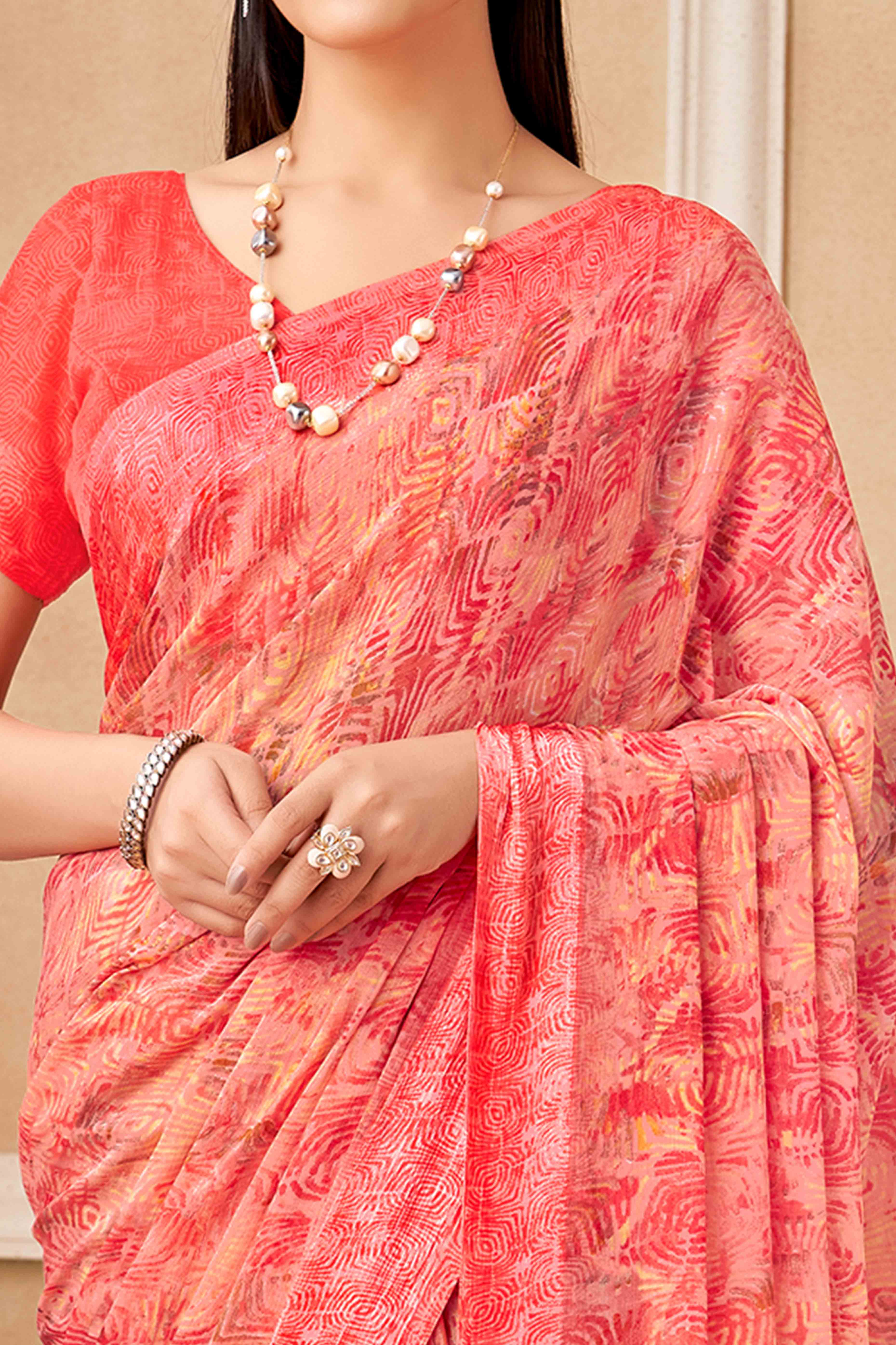 Salmon Pink Chiffon Saree With Delicate Prints & Elegant Satin Woven Border