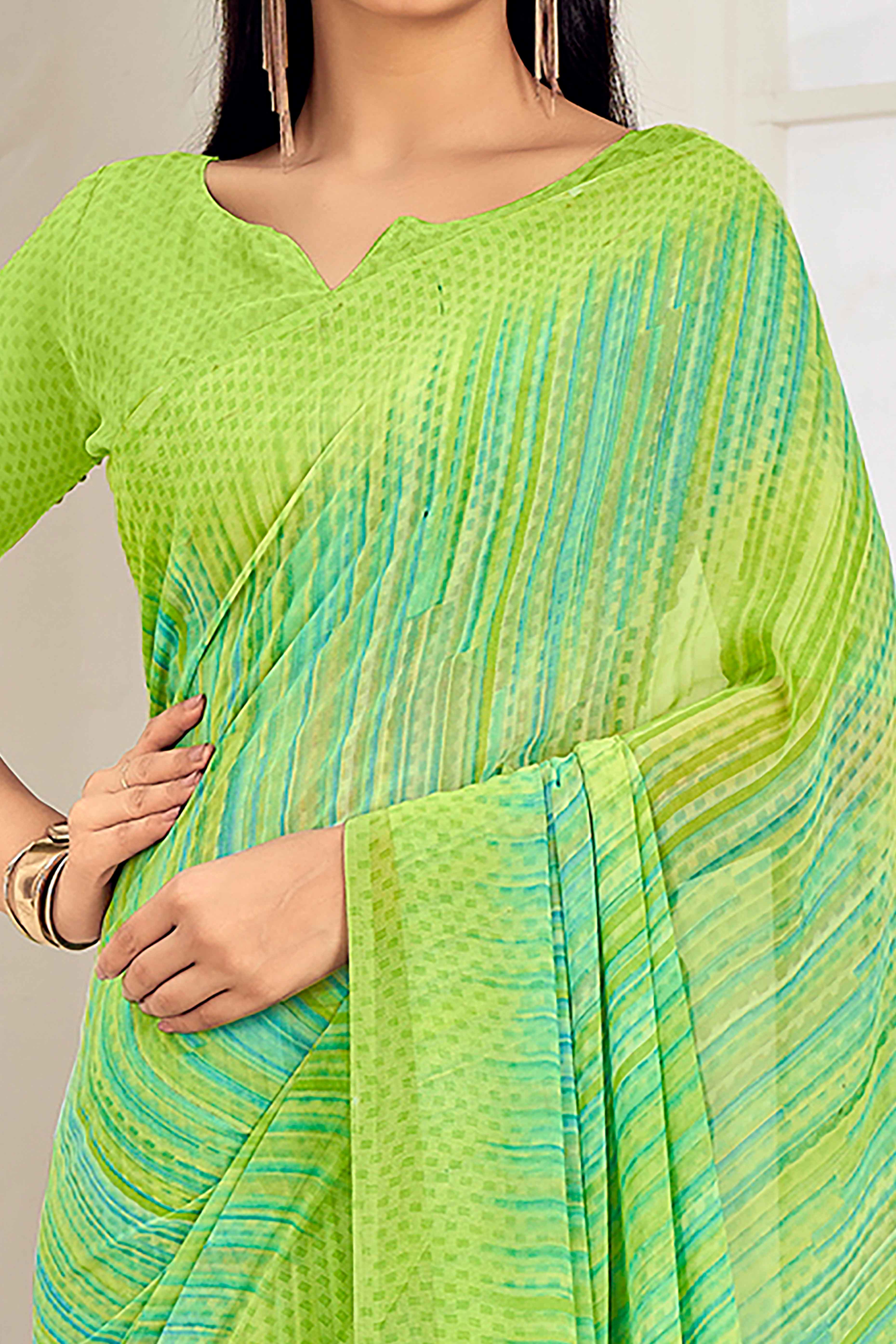 Green Georgette Saree With Stylish Striped Print