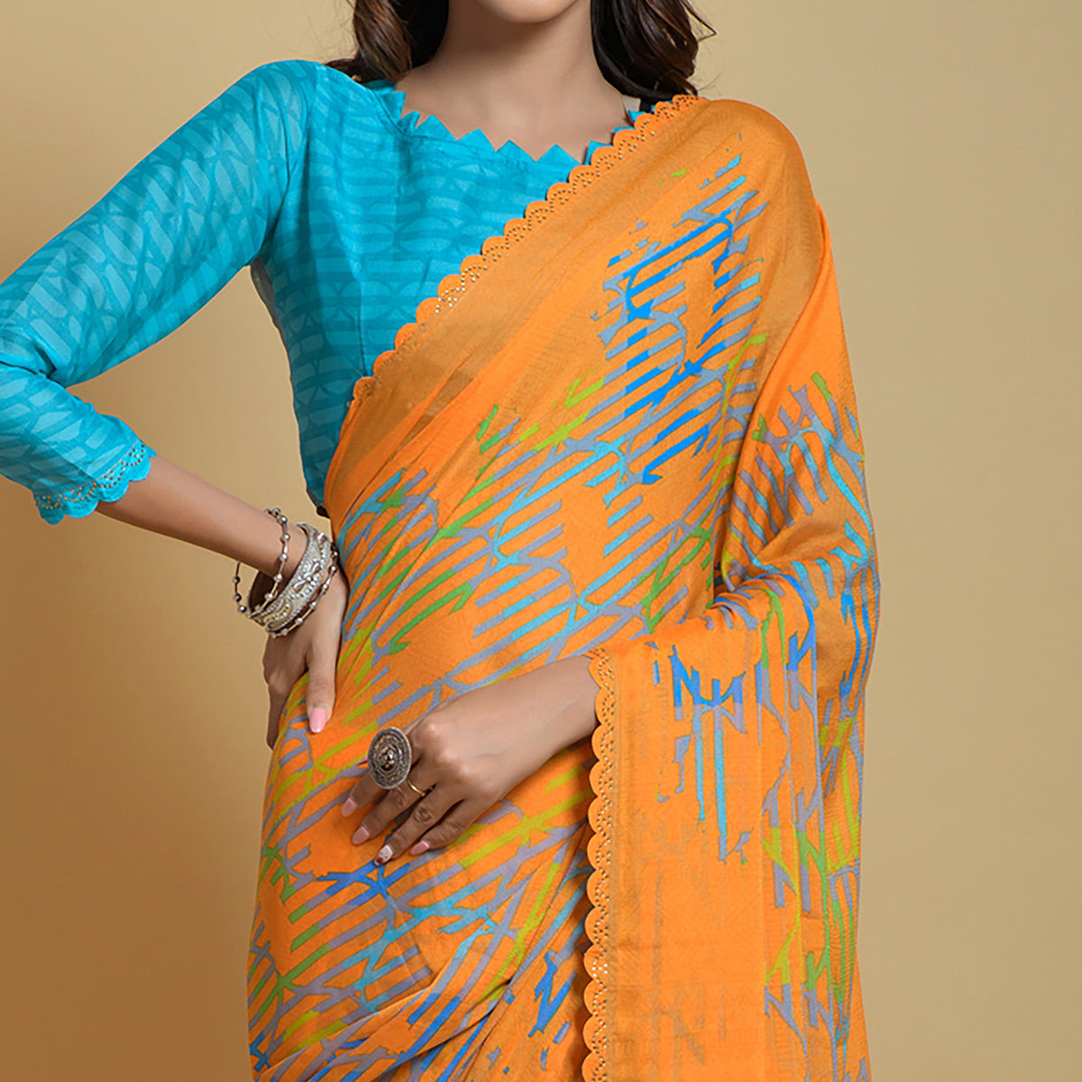 Orange Printed Georgette Saree With Swarovski Border
