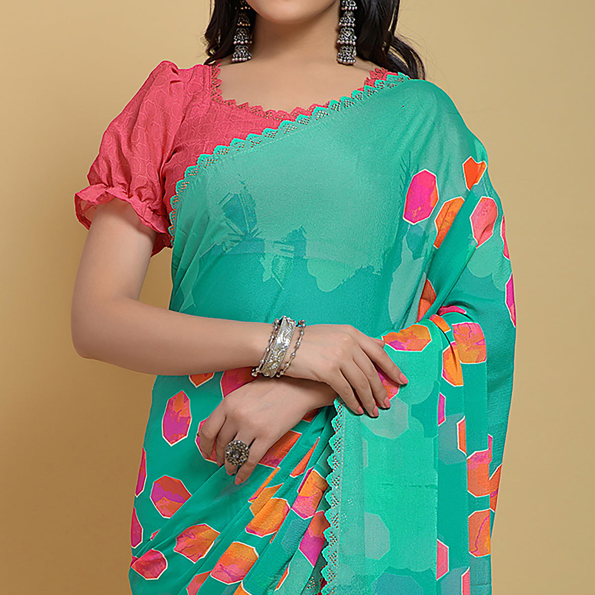 Turquoise Printed Georgette Saree With Swarovski Border