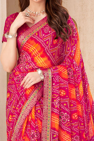Magenta Bandhani Printed Chiffon Saree Enhanced with Delicate Lace Border Work