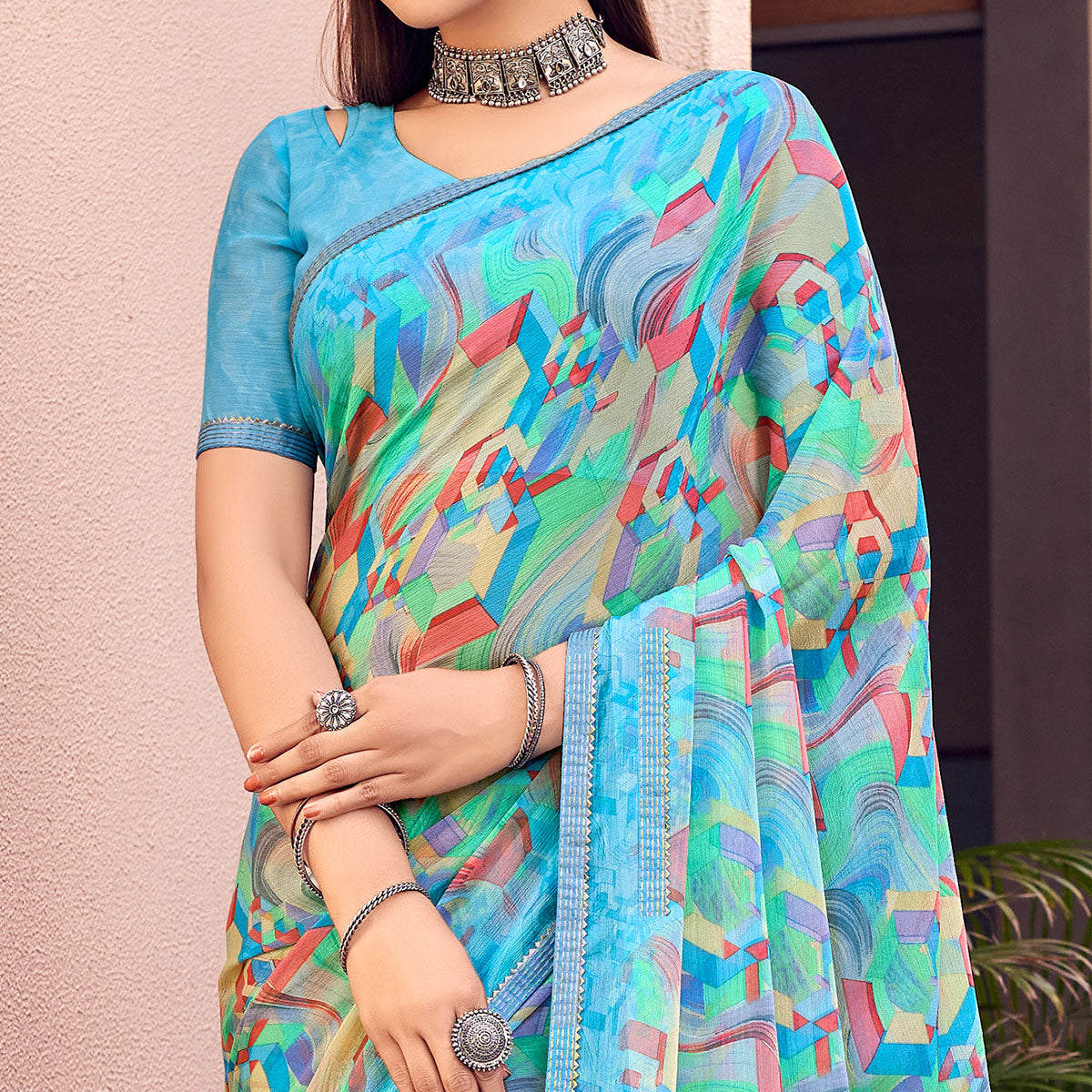 Blue Printed Chiffon Saree With Tassels