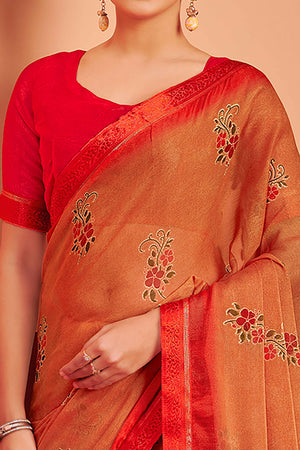 Orange Chiffon Saree Featuring Delicate Floral Prints & A Graceful Lace Border