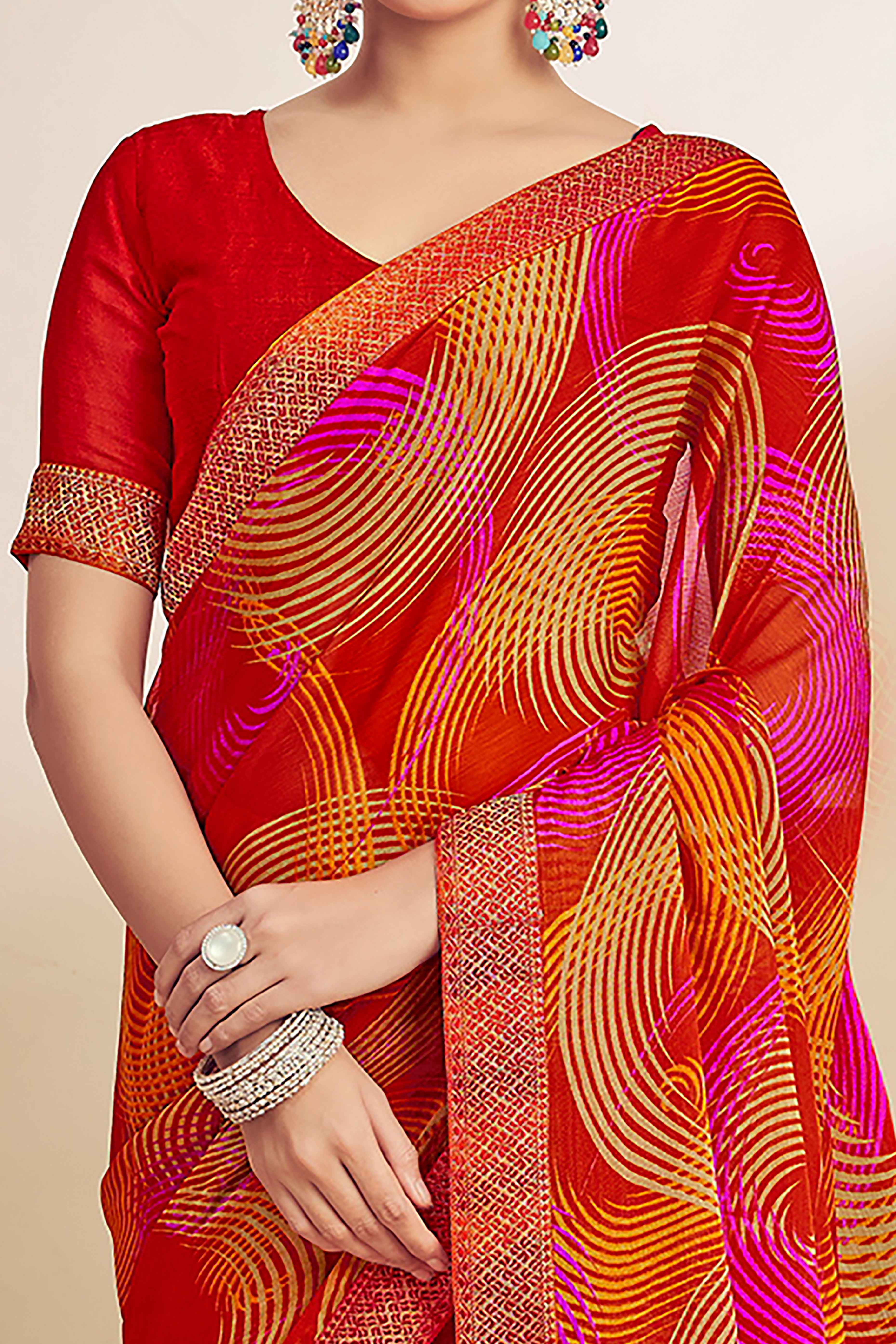 Red Chiffon Saree Adorned With Artistic Print & Finely Crafted Woven Lace Border