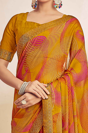 Mustard Chiffon Saree Adorned With Artistic Print & Finely Crafted Woven Lace Border
